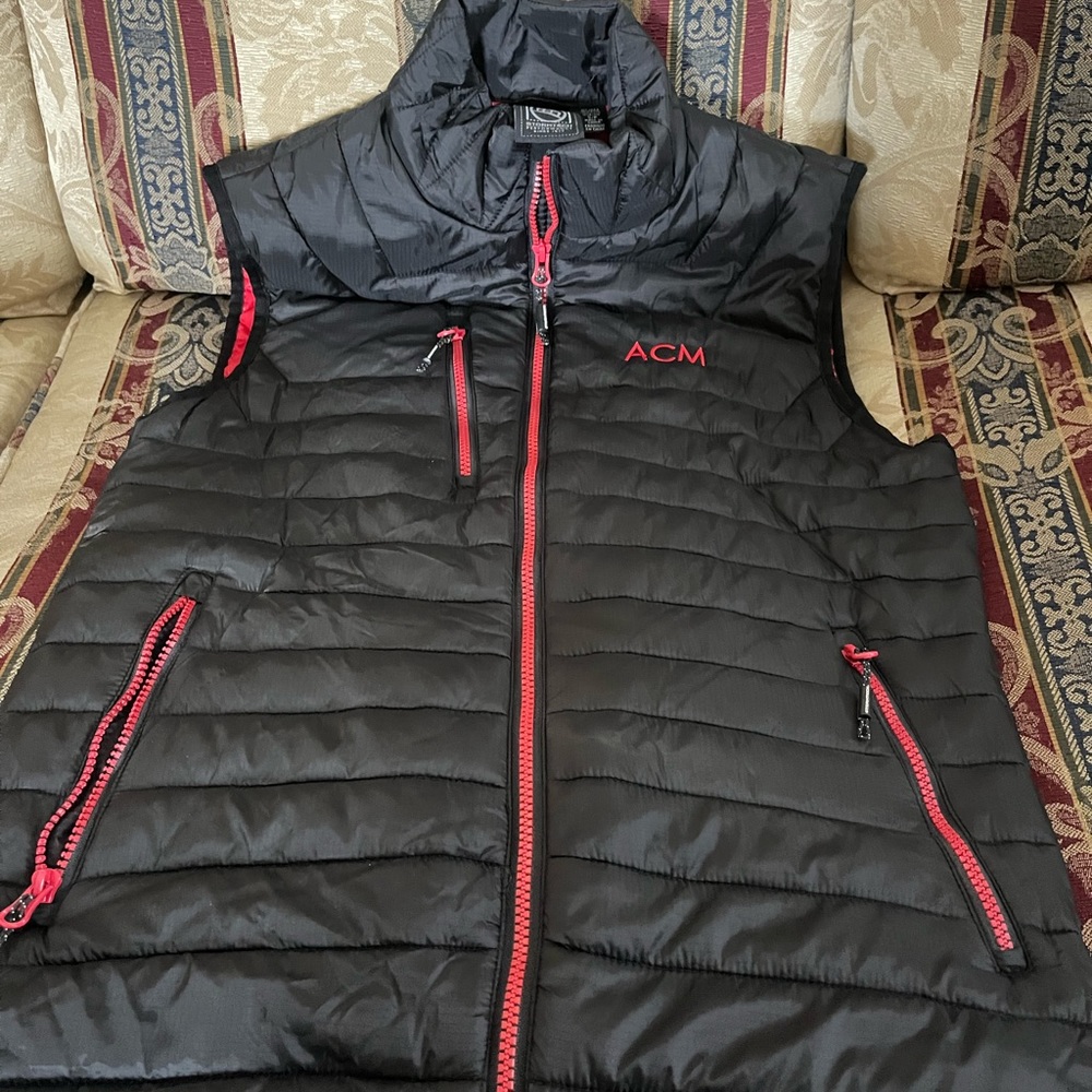 Stormtech performance ladies vest.  Red and black